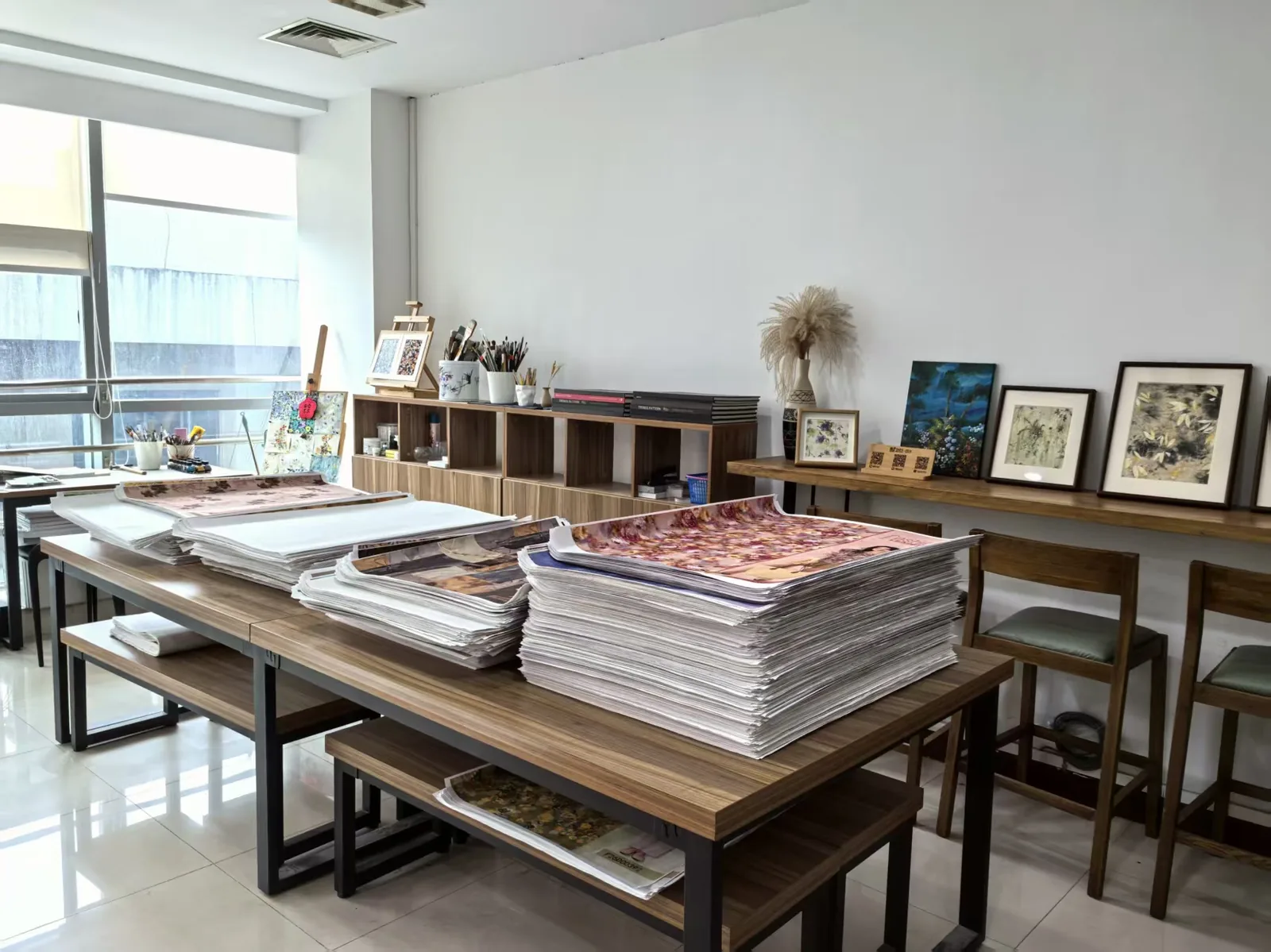 Archive room with stacks of original pattern artwork
