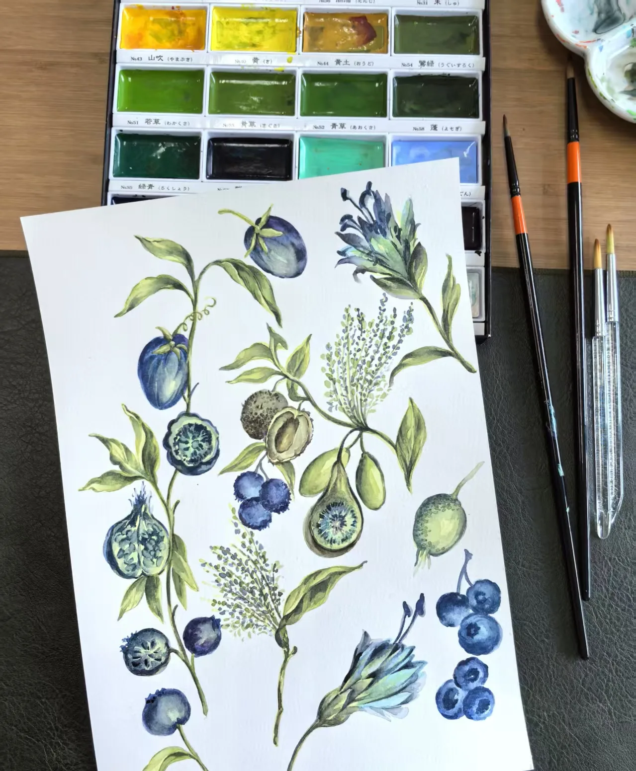 Botanical watercolor illustration with paint palette