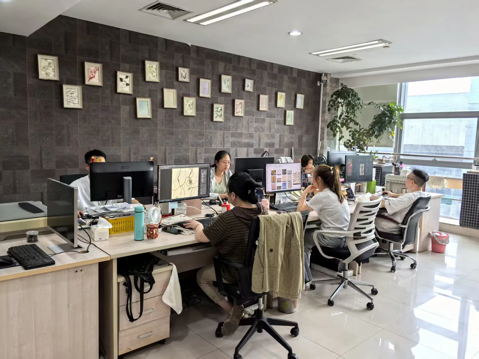 SEE Textile design studio — designers working on original floral patterns