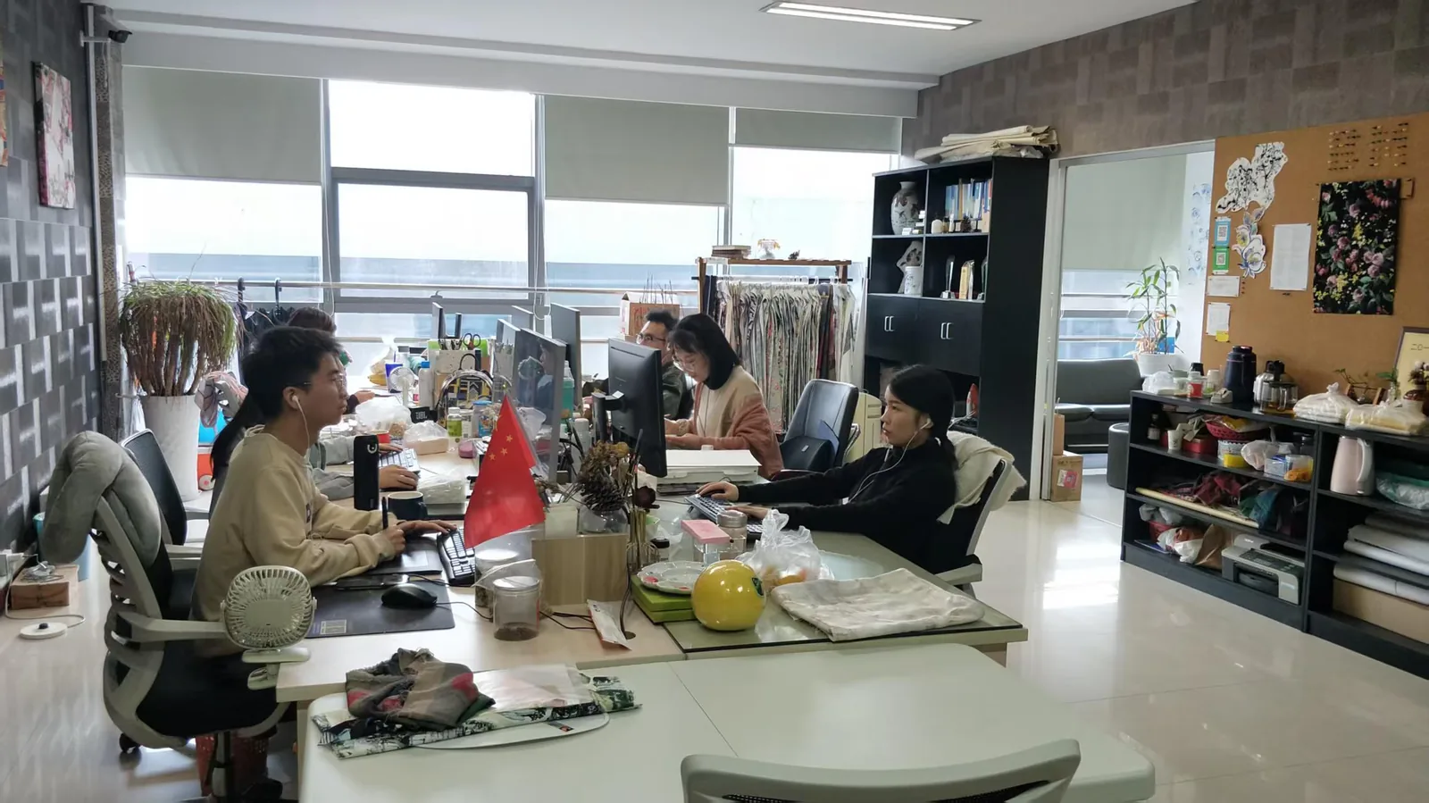 SEE Textile design team working in studio